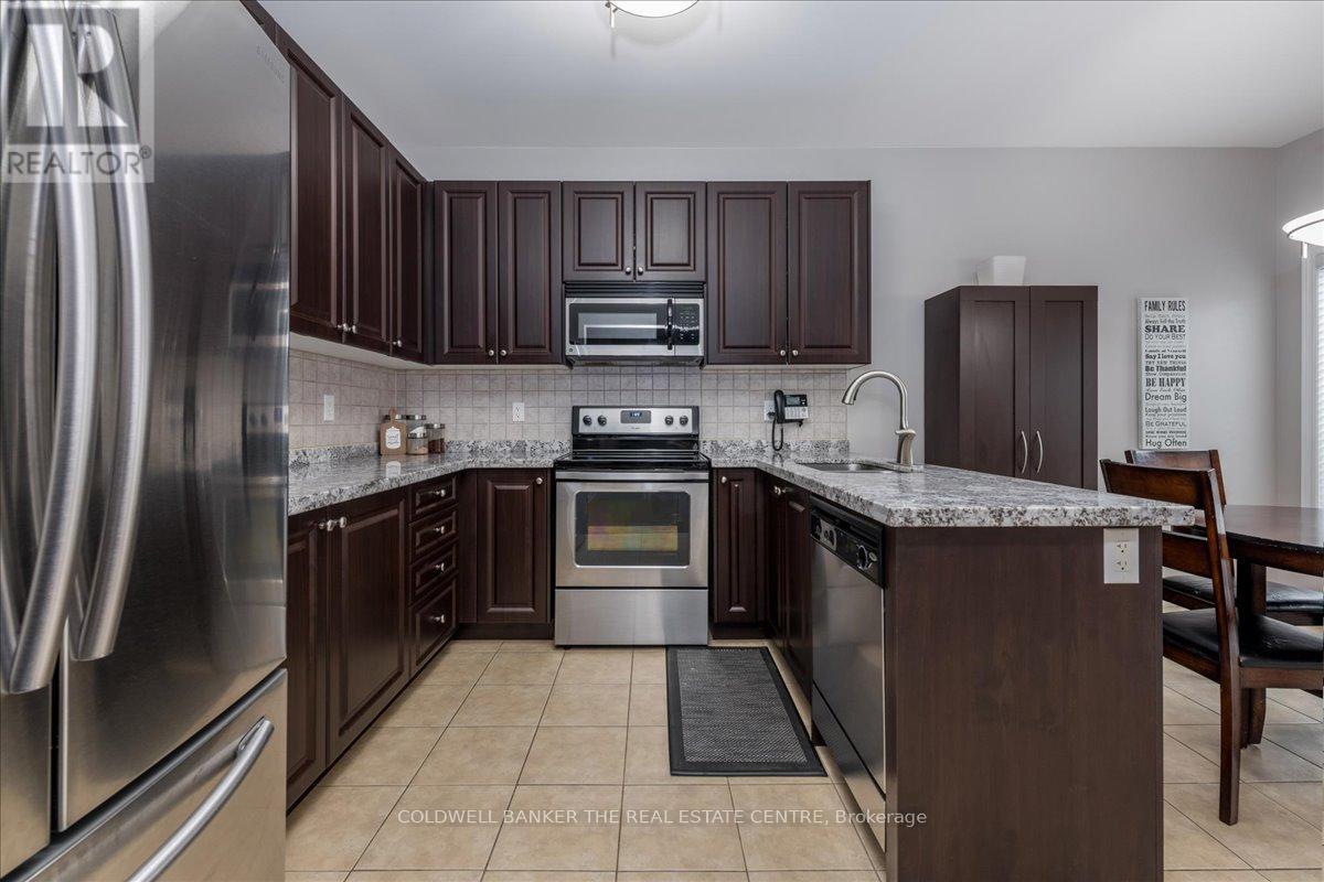 290 Greenwood Drive, Essa, Ontario  L0M 1B4 - Photo 8 - N12136639