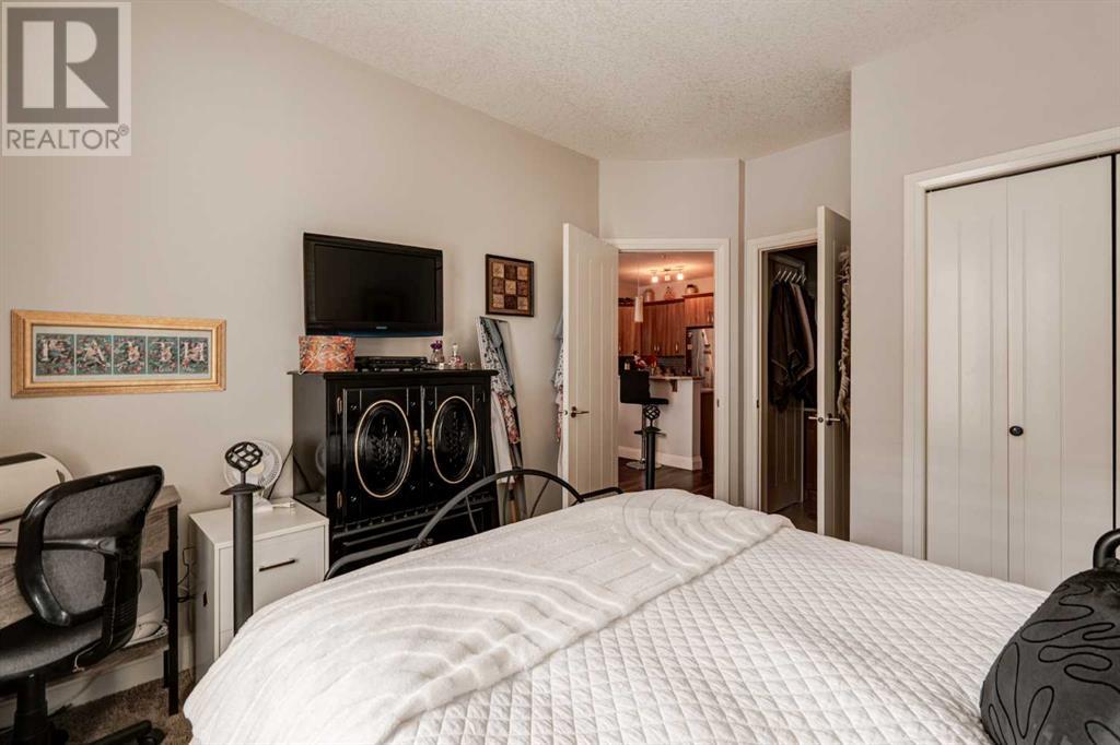 2106, 15 Sunset Square, Cochrane, Alberta  T4C 0E7 - Photo 14 - A2193235