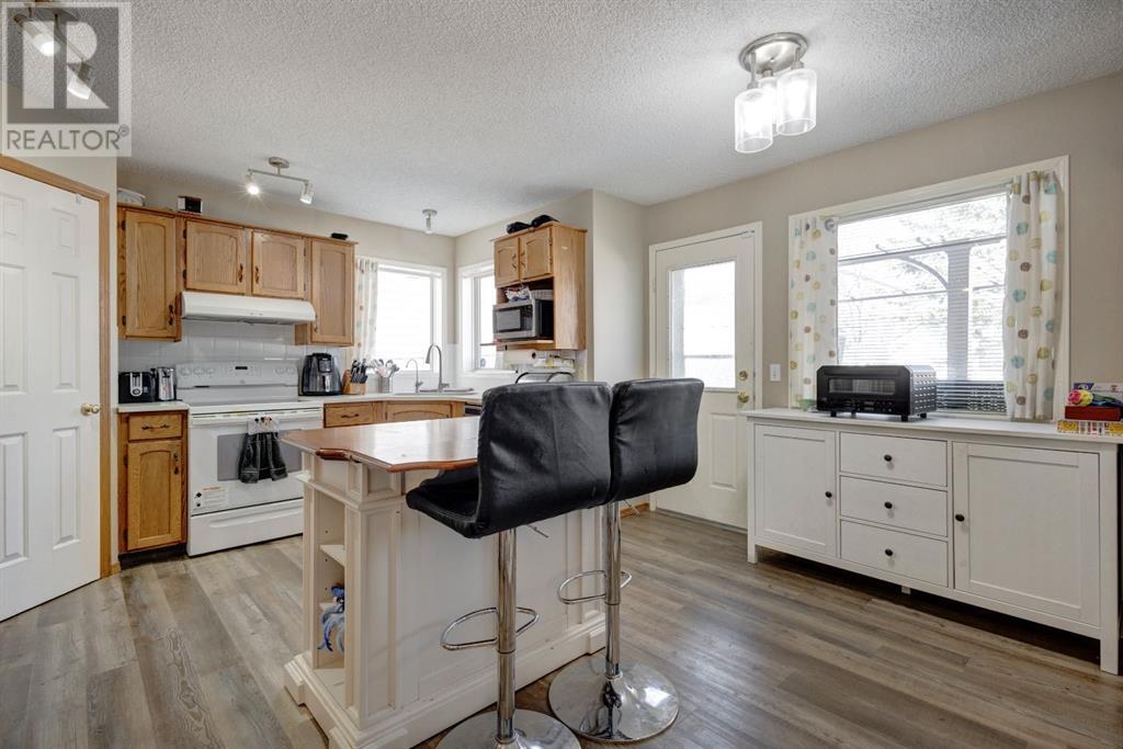 21 Hidden Ranch Circle Nw, Calgary, Alberta  T3A 5N8 - Photo 7 - A2211326