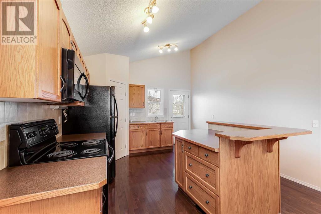 1046 Channelside Way Sw, Airdrie, Alberta  T4B 3H9 - Photo 7 - A2218698