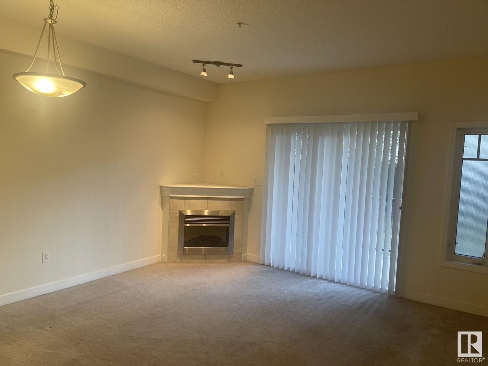 Property at #105 2035 GRANTHAM COURNT NW image 5