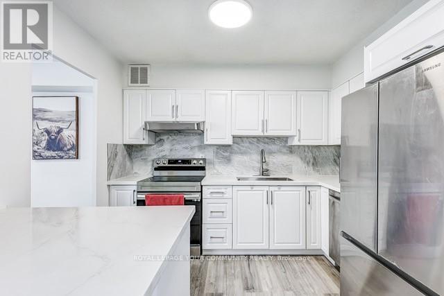 1410 - 451 The West Mall Drive, Toronto, Ontario  M9C 1G1 - Photo 3 - W12130313