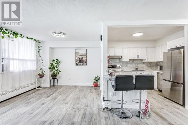 1410 - 451 The West Mall Drive, Toronto, Ontario  M9C 1G1 - Photo 2 - W12130313