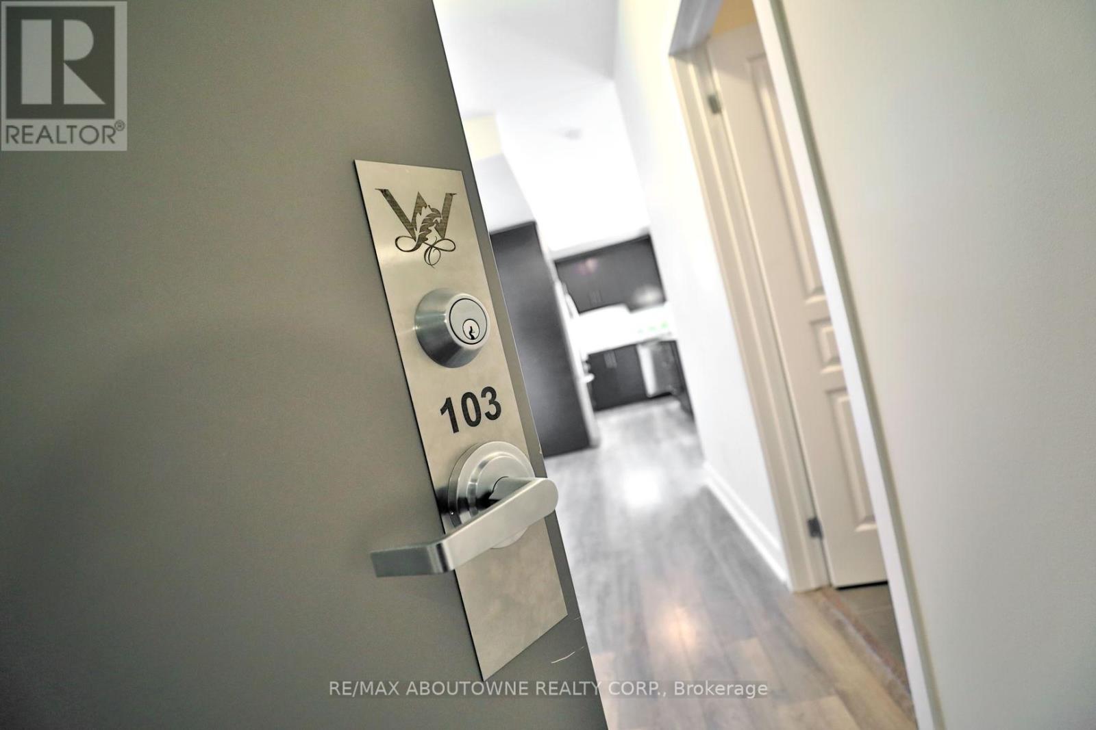 103 - 128 Garden Drive, Oakville (Co Central), Ontario  L6K 0H7 - Photo 6 - W12137742