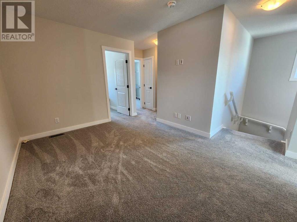 99 Edith Passage Nw, Calgary, Alberta  T3R 2B5 - Photo 28 - A2195869
