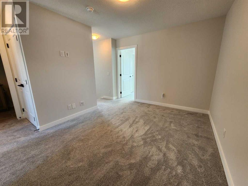 99 Edith Passage Nw, Calgary, Alberta  T3R 2B5 - Photo 29 - A2195869