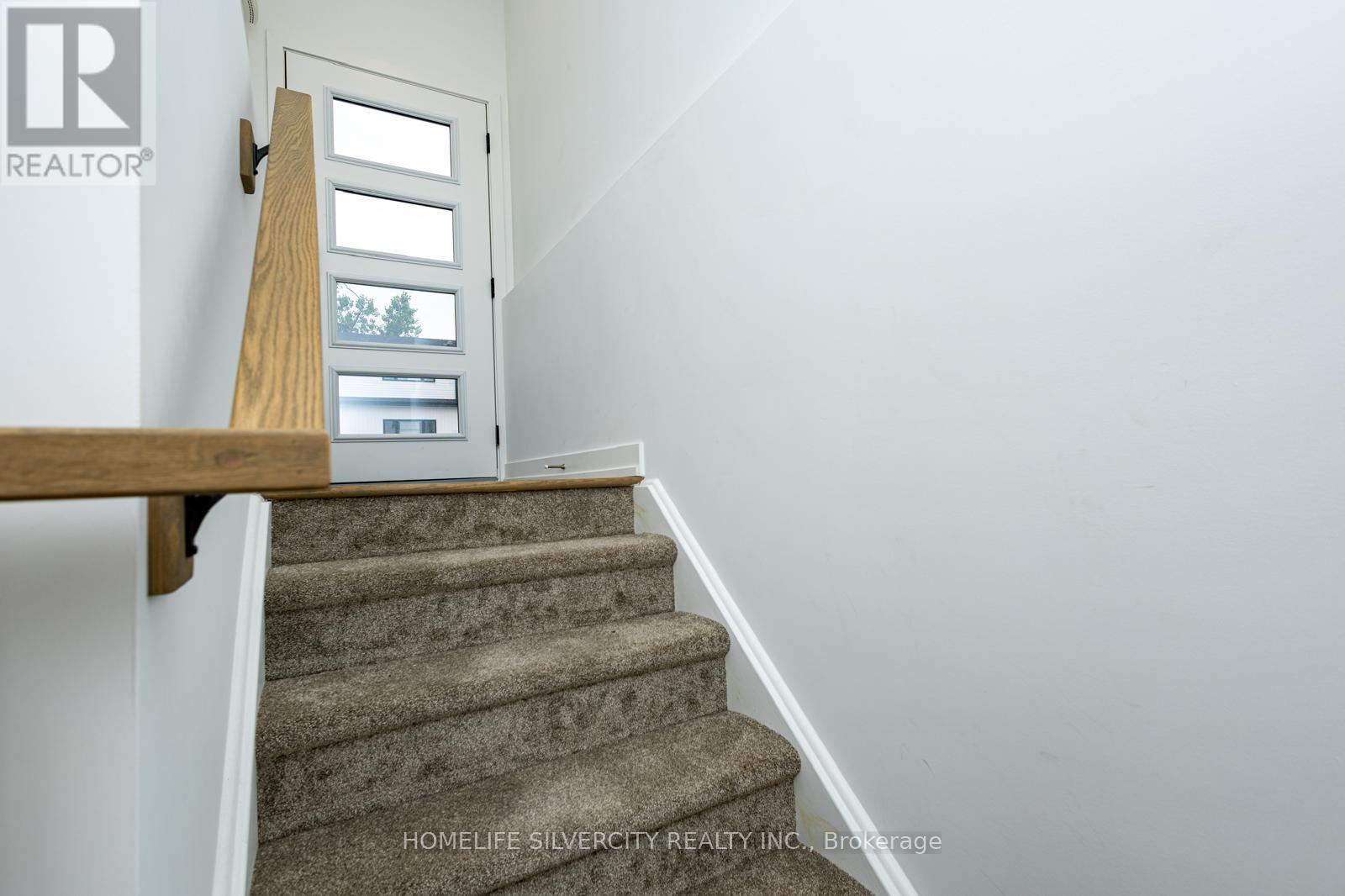 211 - 4263 Fourth Avenue, Niagara Falls, Ontario  L2E 0C2 - Photo 3 - X12138125