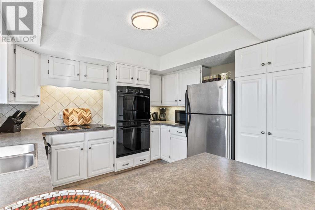 104 Woodgate Close Sw, Calgary, Alberta  T2W 4C1 - Photo 16 - A2219666
