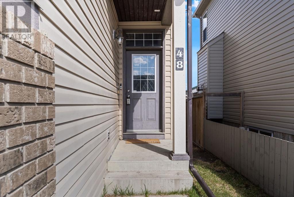 48 Cimarron Grove Way, Okotoks, Alberta  T1S 2L9 - Photo 3 - A2215933