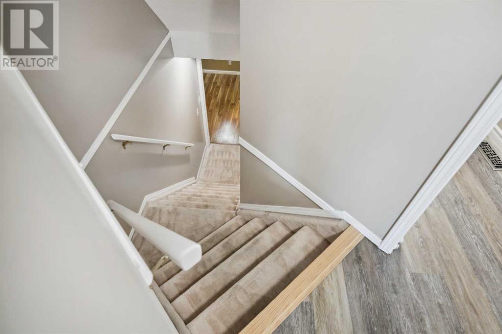 100 Hidden Green Nw, Calgary, Alberta  T3A 5K7 - Photo 36 - A2208641