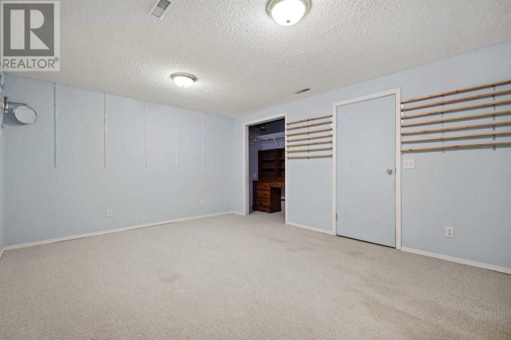 100 Hidden Green Nw, Calgary, Alberta  T3A 5K7 - Photo 41 - A2208641