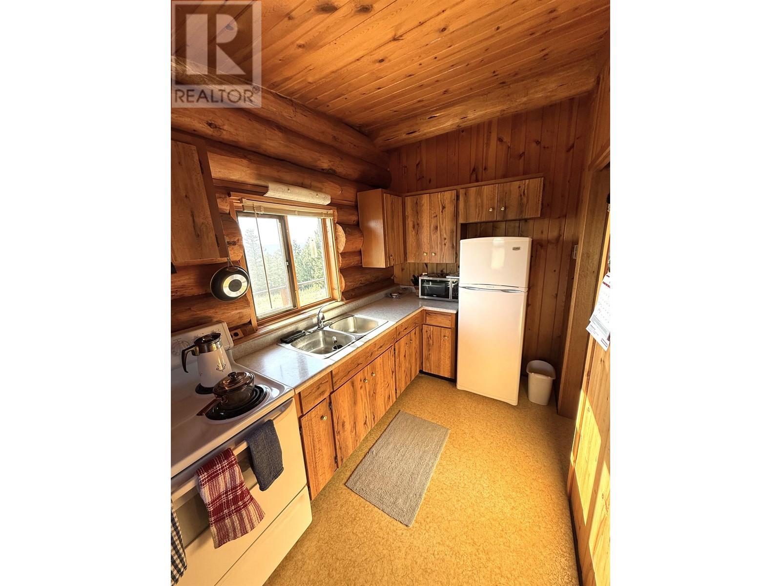 5549 Backvalley Road, 100 Mile House, British Columbia  V0K 2Z0 - Photo 12 - R3000144