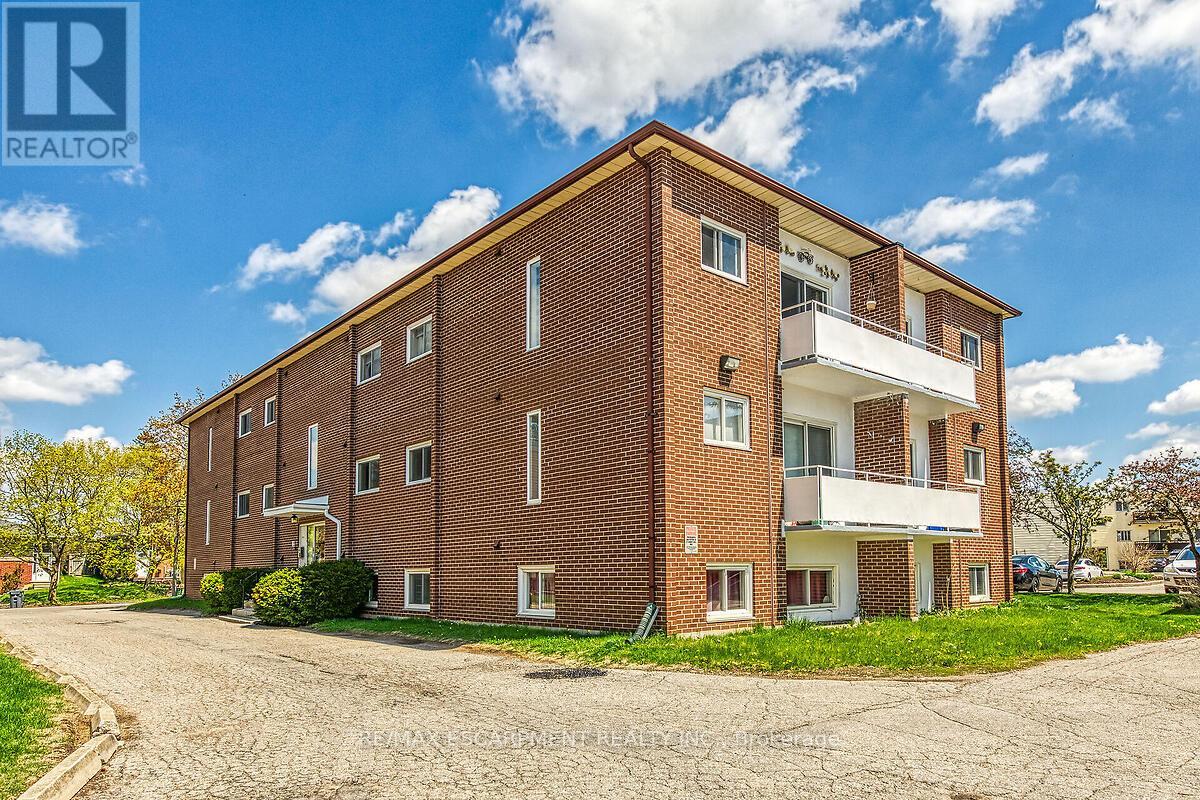 304 - 57 Conroy Crescent, Guelph, Ontario  N1G 2V5 - Photo 3 - X12139484