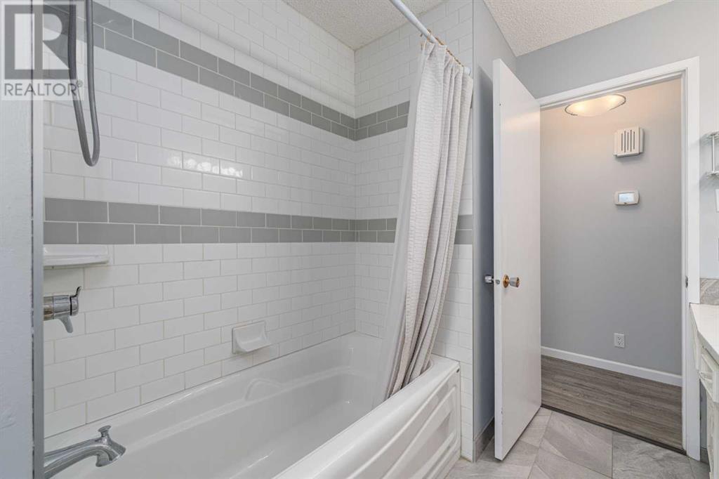 7428 Huntertown Crescent Nw, Calgary, Alberta  T2K 4K2 - Photo 15 - A2219996