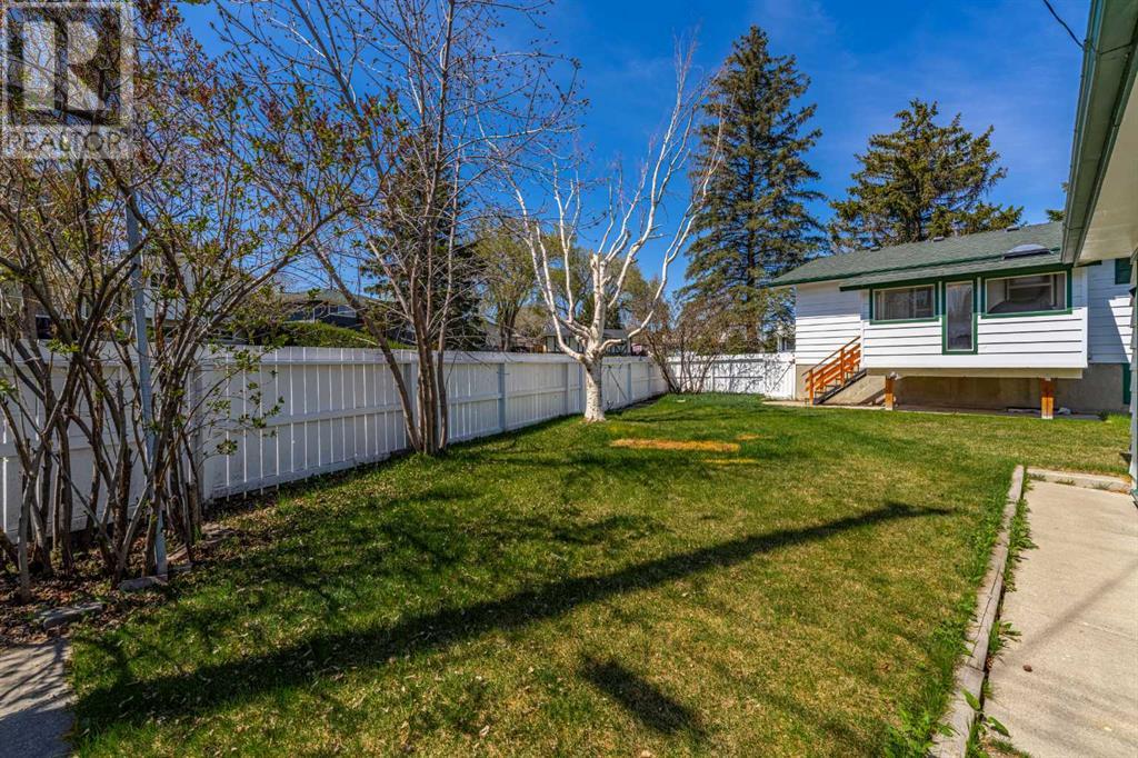 7428 Huntertown Crescent Nw, Calgary, Alberta  T2K 4K2 - Photo 29 - A2219996