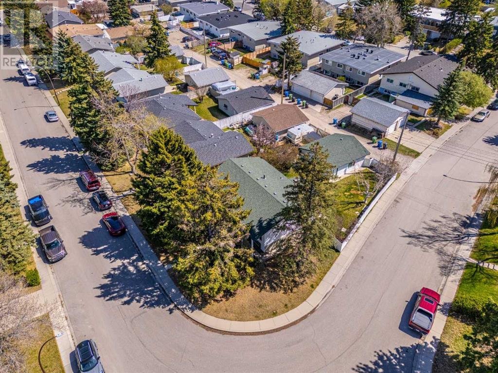 7428 Huntertown Crescent Nw, Calgary, Alberta  T2K 4K2 - Photo 36 - A2219996