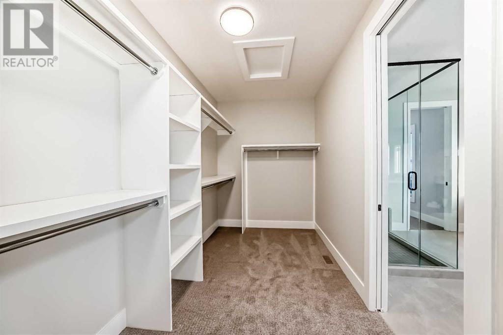 386 Spring Creek Circle Sw, Calgary, Alberta  T3H 6G4 - Photo 21 - A2206788