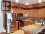 496 Stonehenge Drive, Hamilton, Ontario  L9K 1S7 - Photo 2 - X12140156