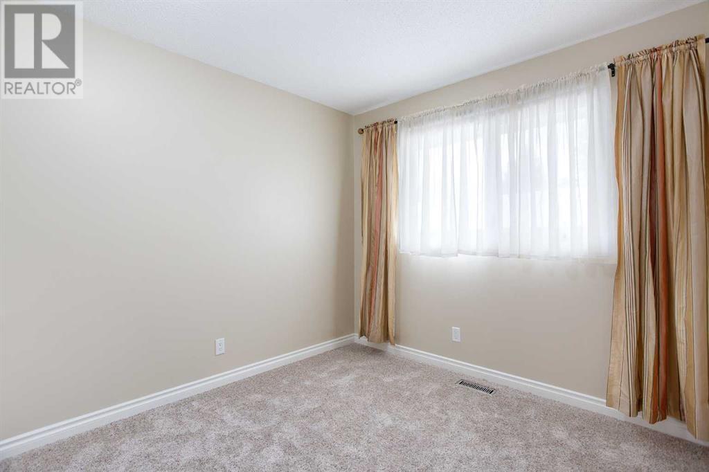 940 Lake Arrow Way Se, Calgary, Alberta  T2J 3C3 - Photo 23 - A2213627