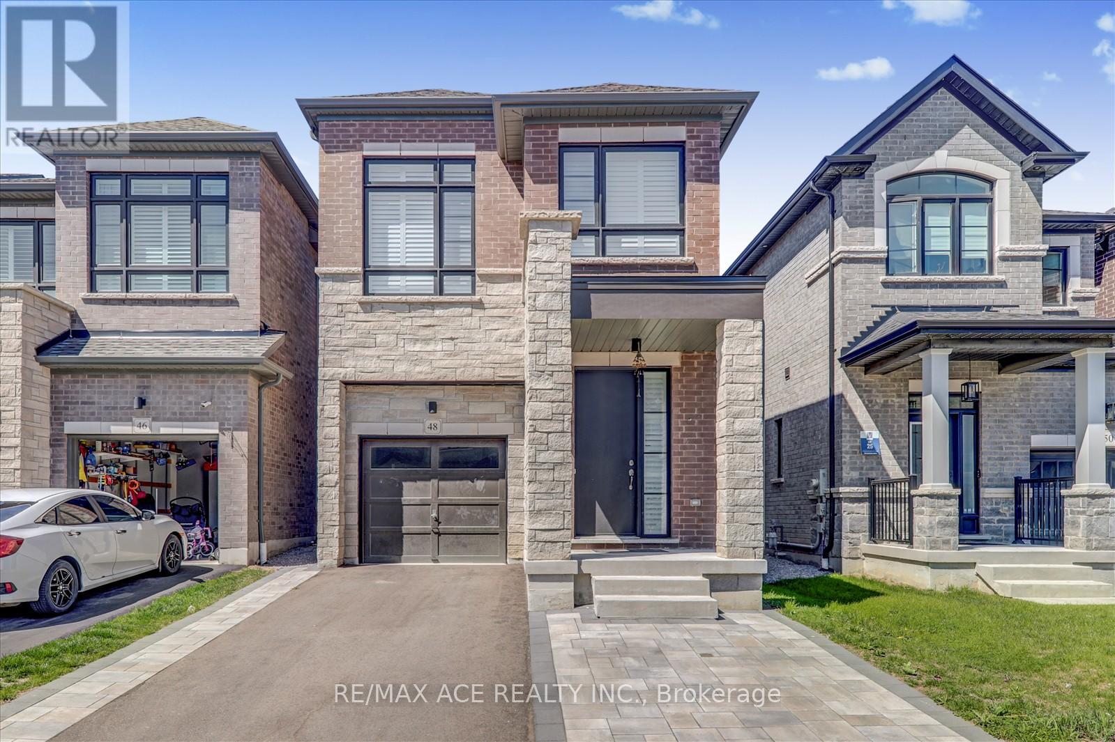 48 CLOSSON DRIVE, Whitby, Ontario