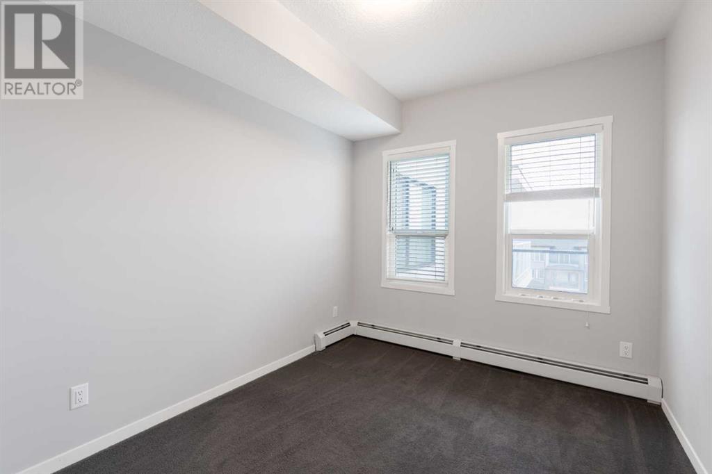 401, 4350 Seton Drive Se, Calgary, Alberta  T3M 3B1 - Photo 17 - A2209754