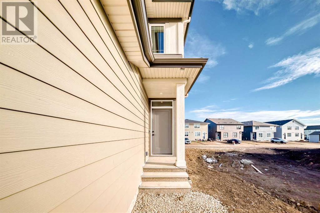 28 Magnolia Green Se, Calgary, Alberta  T3M 3T5 - Photo 2 - A2201165