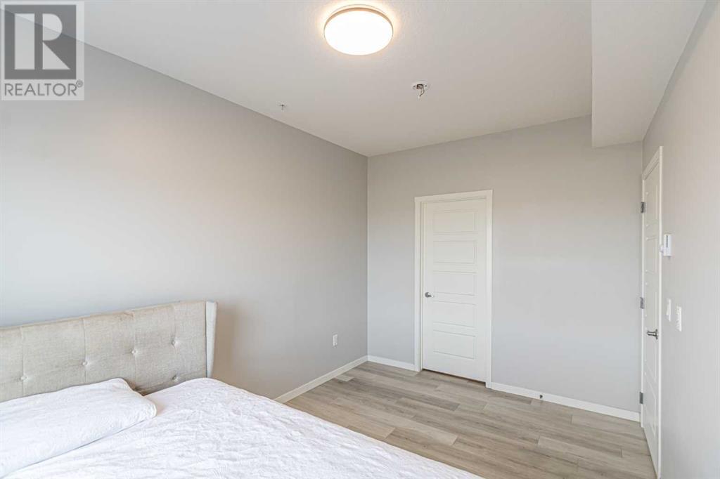 203, 360 Harvest Hills Way Ne, Calgary, Alberta  T3K 2S1 - Photo 11 - A2217355