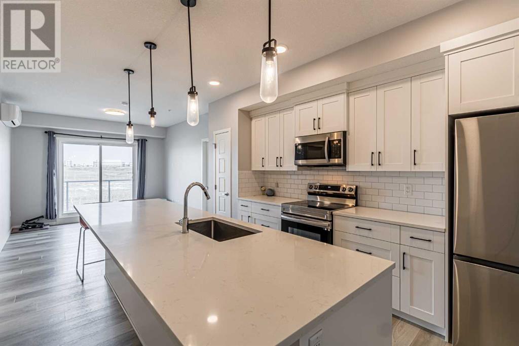 203, 360 Harvest Hills Way Ne, Calgary, Alberta  T3K 2S1 - Photo 2 - A2217355
