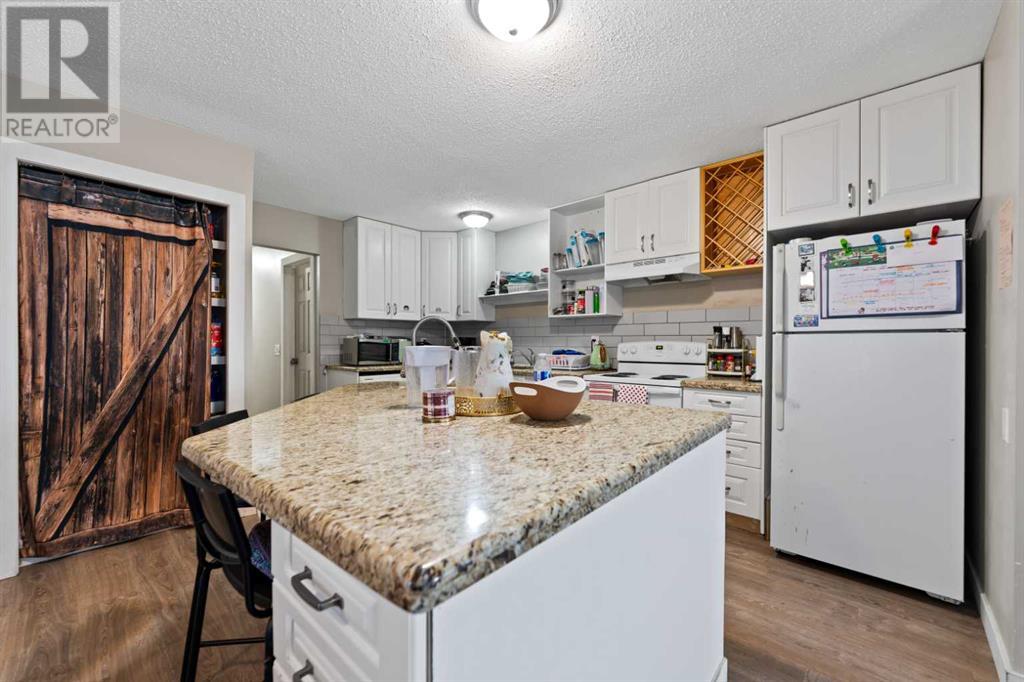 565 Aboyne Crescent Ne, Calgary, Alberta  T2A 5Y7 - Photo 10 - A2214366