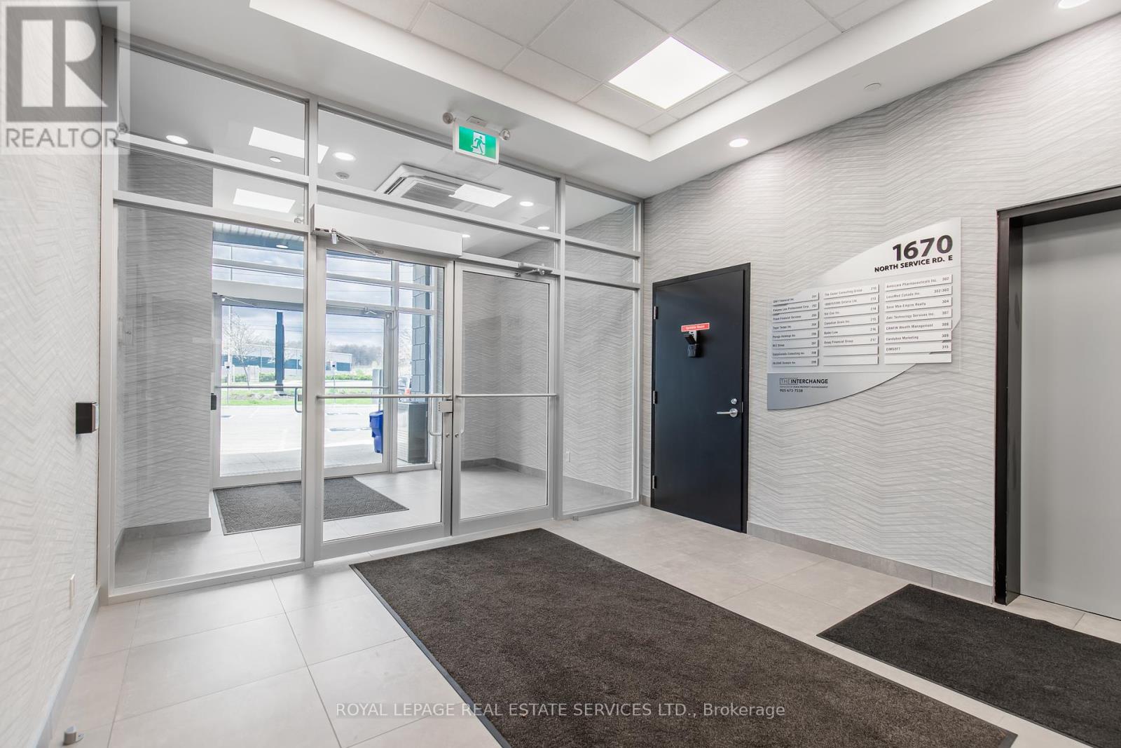 215 - 1670 North Service Road, Oakville, Ontario  L6H 7G3 - Photo 3 - W12140800