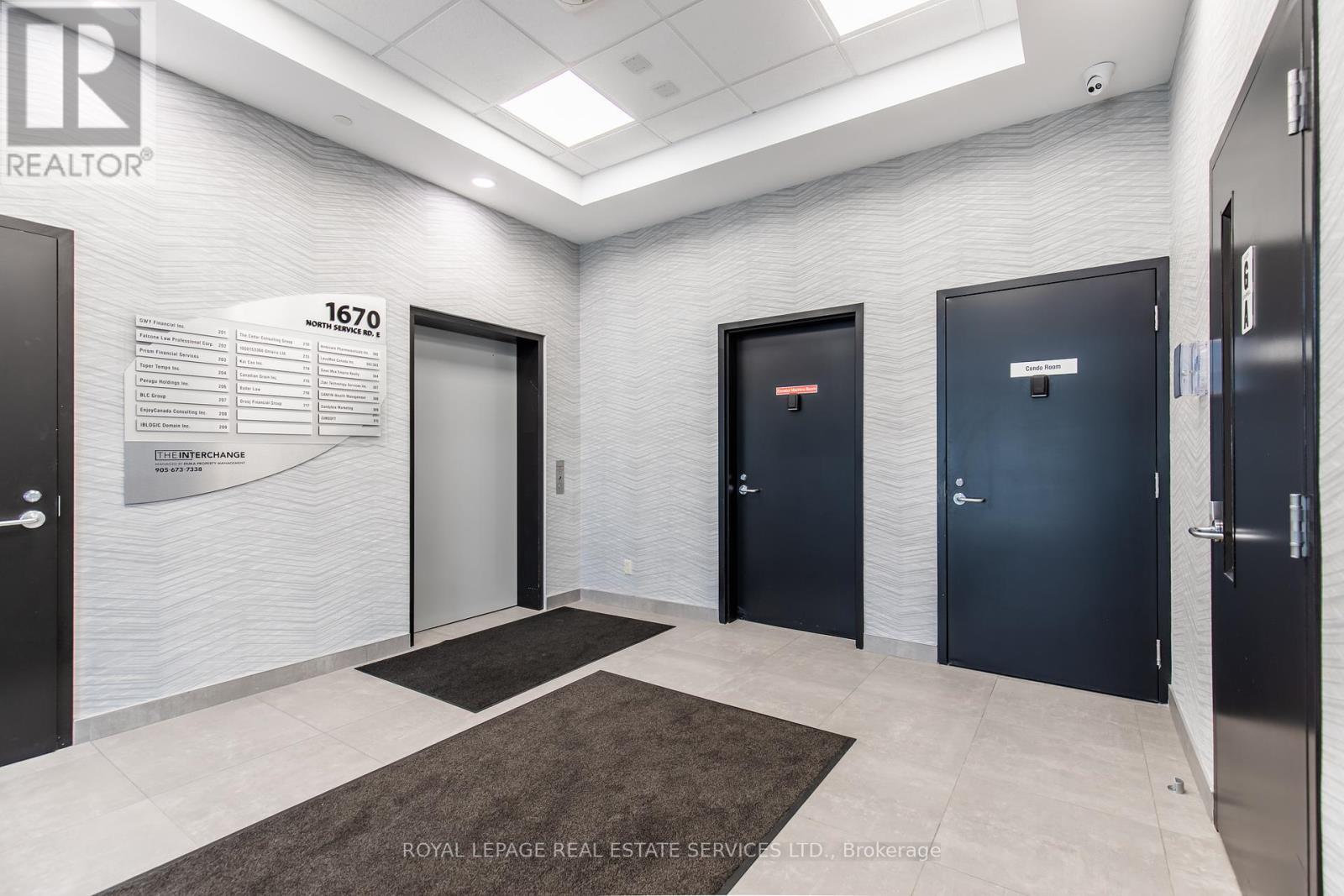 215 - 1670 North Service Road, Oakville, Ontario  L6H 7G3 - Photo 4 - W12140800