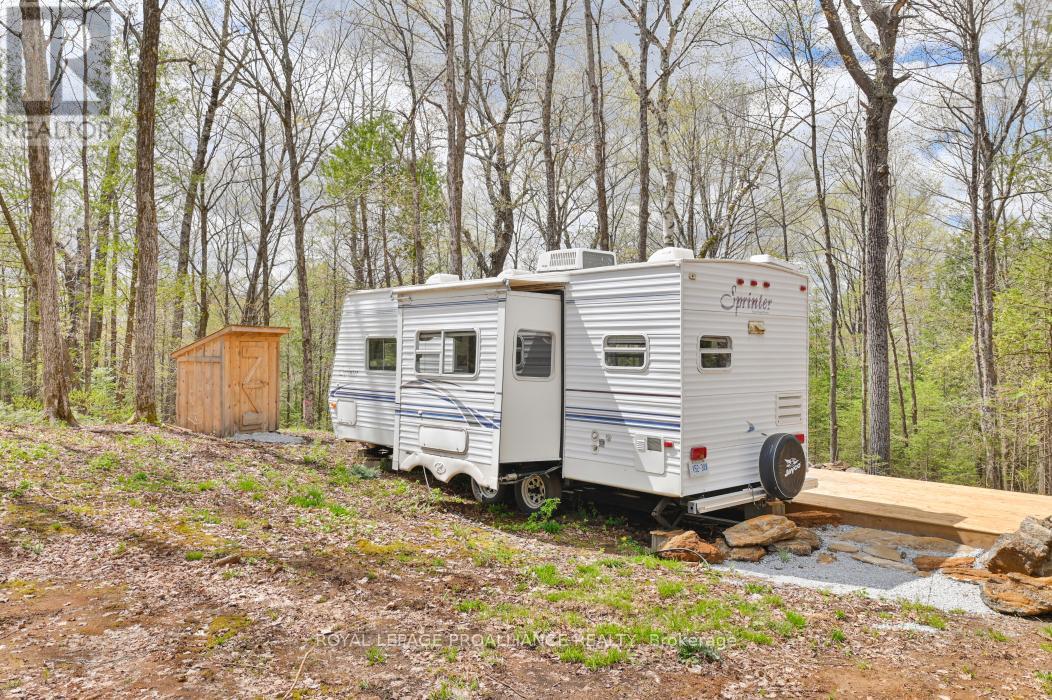 2060 Smith Road, North Frontenac, Ontario K0H 1C0 - Photo 3 - X12122276
