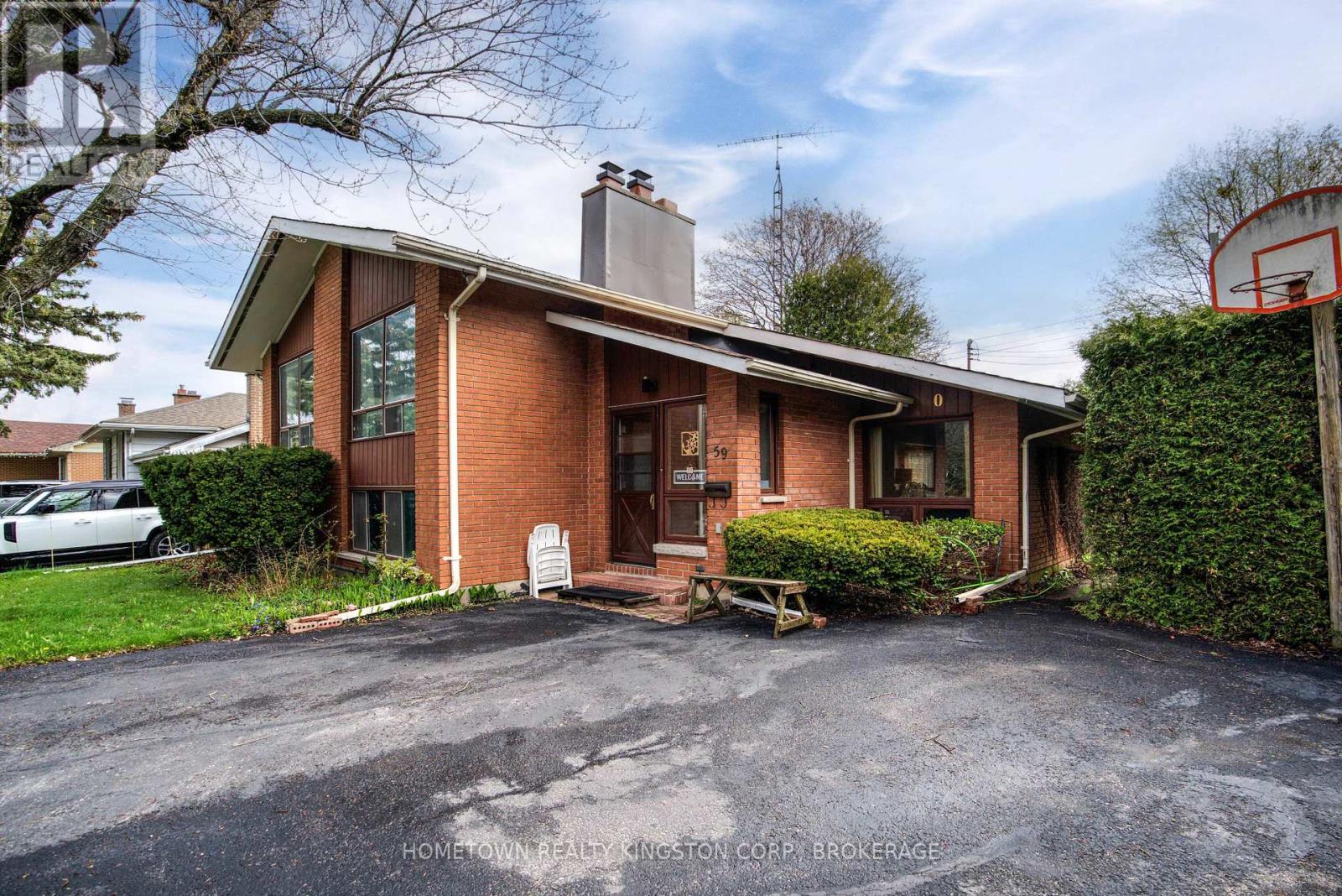 59 Holland Crescent, Kingston, Ontario  K7M 2V7 - Photo 2 - X12141275