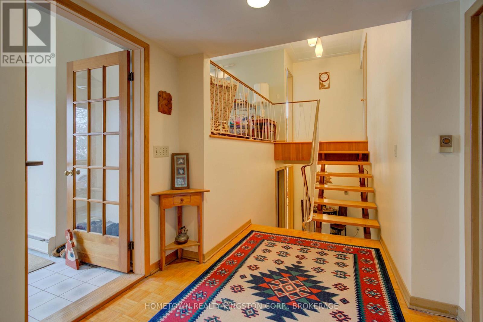 59 Holland Crescent, Kingston, Ontario  K7M 2V7 - Photo 4 - X12141275