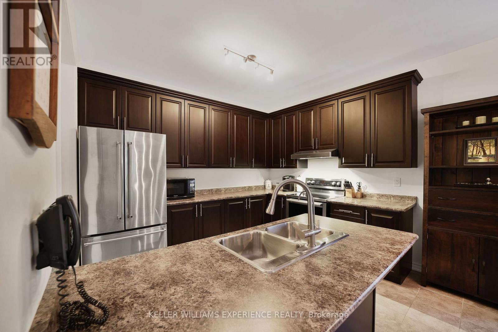248 Greenwood Drive, Essa, Ontario  L3W 0E9 - Photo 12 - N12141076
