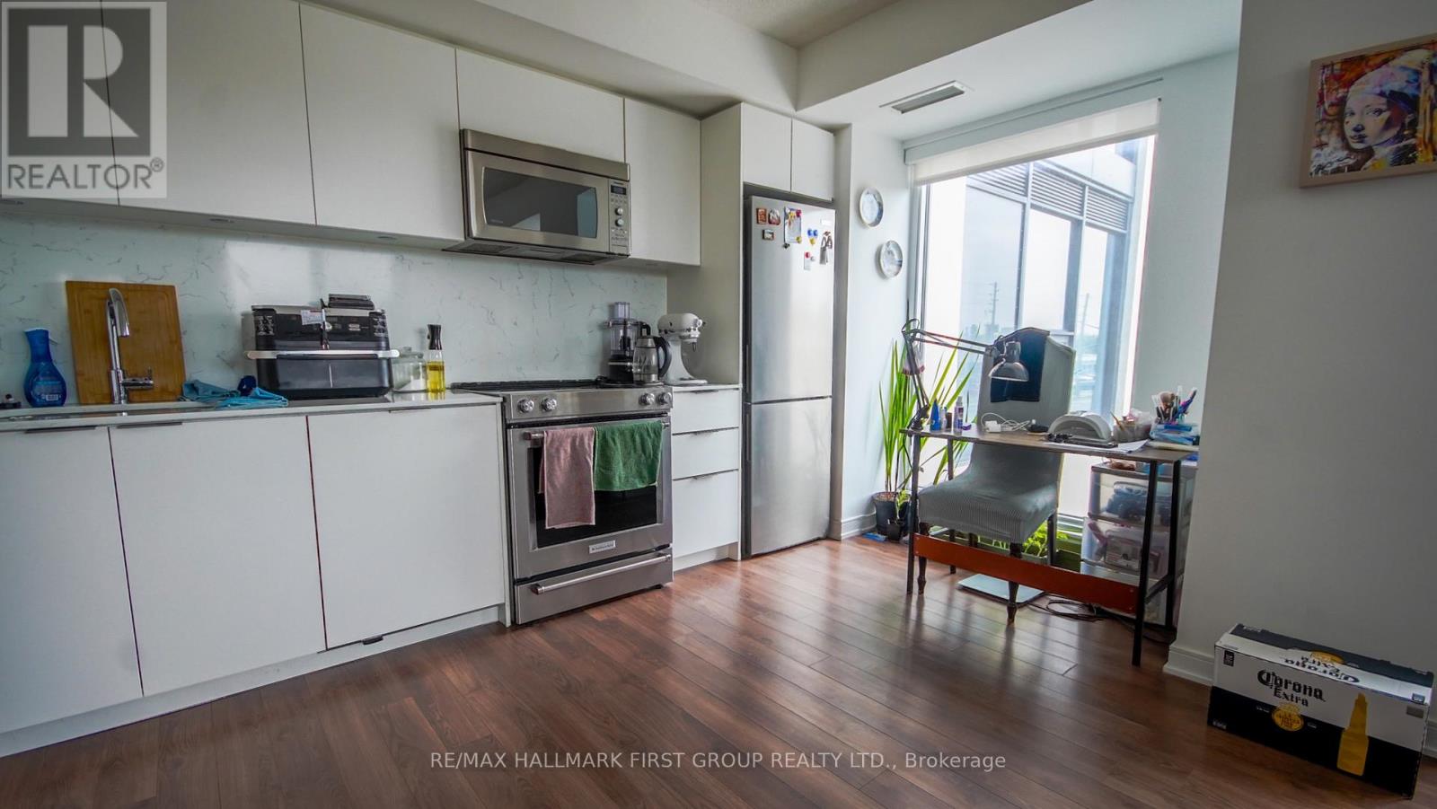 203 - 30 Samuel Wood Way, Toronto, Ontario  M9B 1B1 - Photo 4 - W12141140