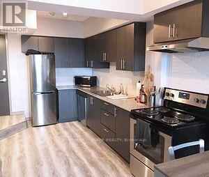G215 - 275 Larch Street, Waterloo, Ontario  N2L 3R2 - Photo 4 - X12132390