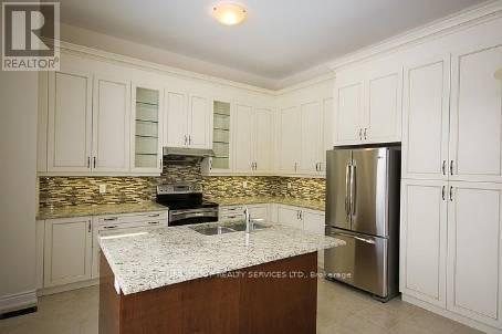 58 Mediterranean Crescent, Brampton, Ontario  L6Y 0T3 - Photo 2 - W12141687