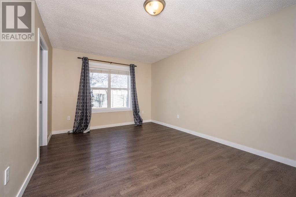 6031 Lacombe Way Sw, Calgary, Alberta  T3E 5T4 - Photo 16 - A2202743