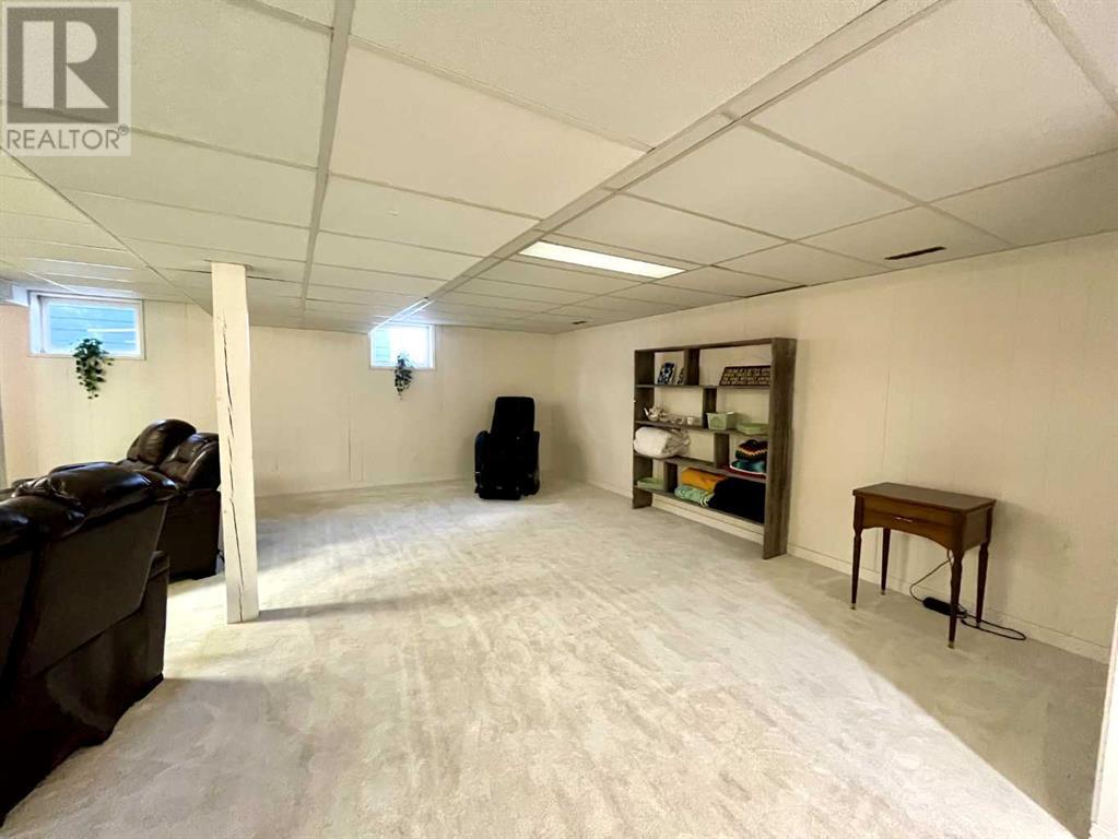 202 Slade Drive, Nanton, Alberta  T0L 1R0 - Photo 36 - A2214024