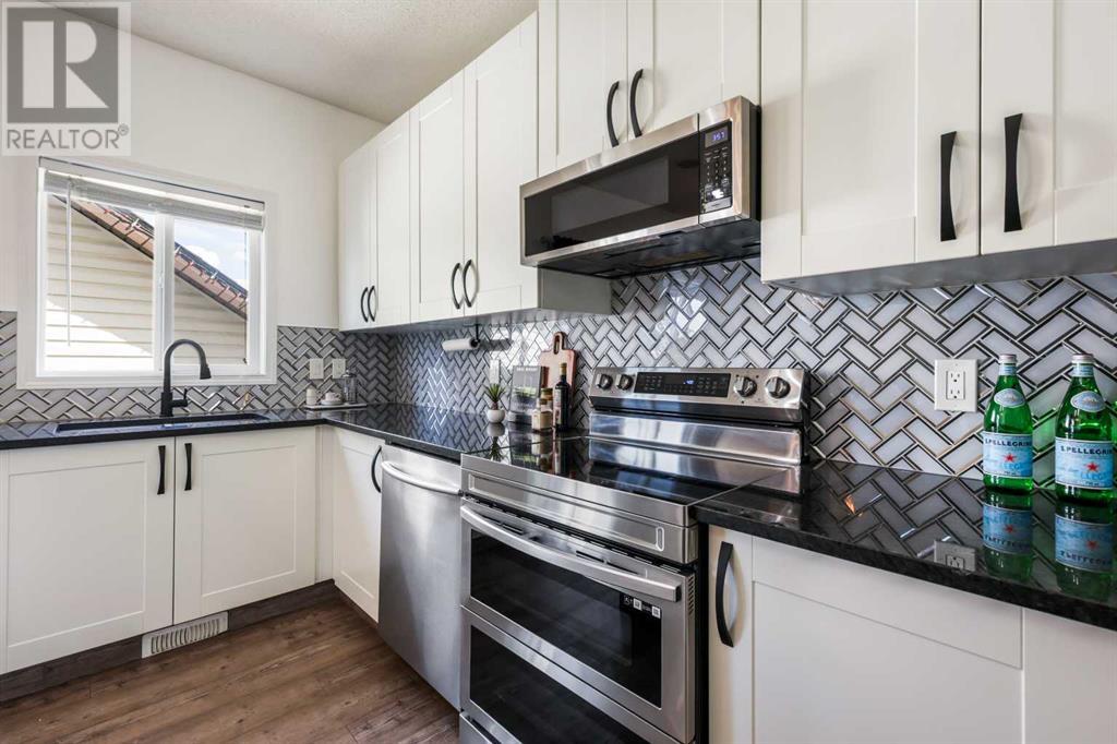 56 Cimarron Grove Way, Okotoks, Alberta  T1S 2L9 - Photo 7 - A2213505
