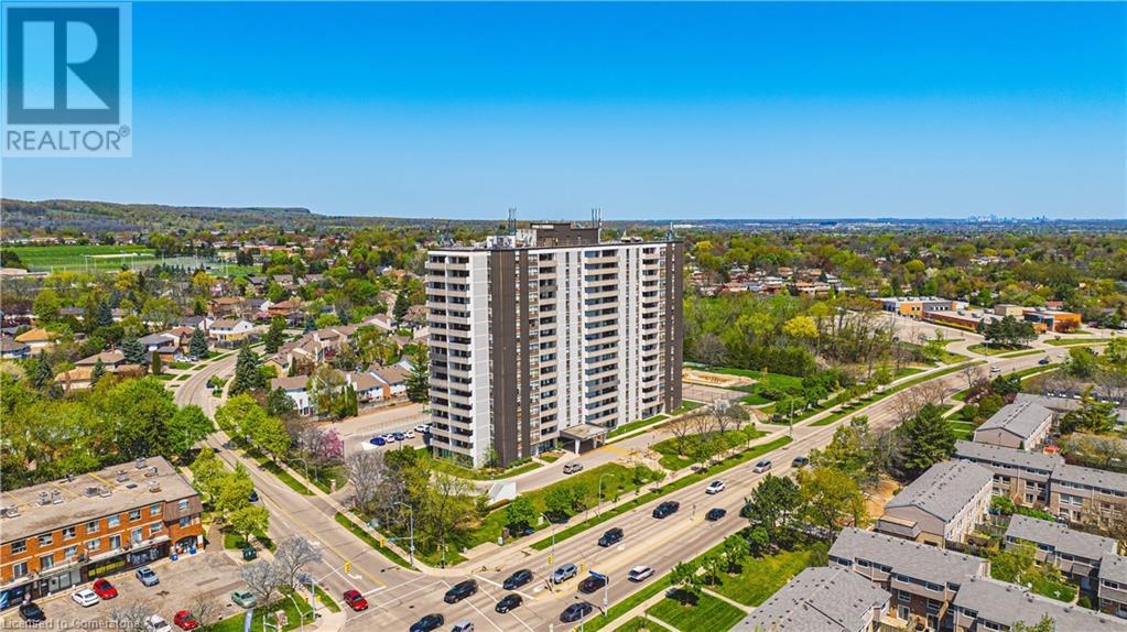 Located in the desirable Brant Hills community, this inviting 1-bedroom + den condo offers over 1,000 sq. ft. of comfortable living space. The generously sized primary bedroom features a walk-through closet leading to a private 2-piece ensuite. The versatile den is perfect for a home office, TV lounge, or reading nook. Recently updated engineered hardwood flooring runs throughout the bright, spacious interior, providing a warm and stylish backdrop. Large windows frame the stunning, ever-changing beauty of the natural surroundings. Indulge in a lifestyle of comfort, with every essential just a short walk away—shopping, public transit, places of worship, and parks. Plus, enjoy quick and easy access to major highways, simplifying your commute. As part of a vibrant community, you'll experience a true sense of belonging. The condo fee encompasses all utilities—heat, hydro, central air conditioning, water, Bell Fibe TV, exterior maintenance, common elements, building insurance, parking, and guest parking. Welcome to unparalleled comfort and convenience, where everything you need is right at your doorstep! (id:48254)