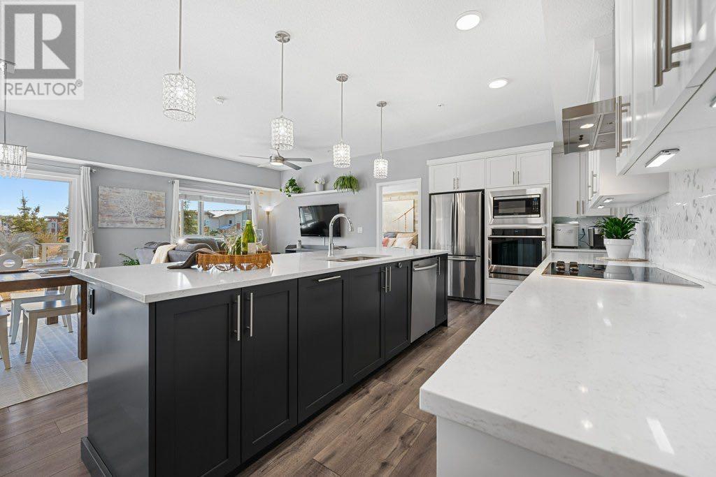 Property at 114, 370 Harvest Hills Common NE image 2