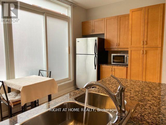 36 Michael Power Place, Toronto, Ontario  M9A 5G9 - Photo 2 - W12142954