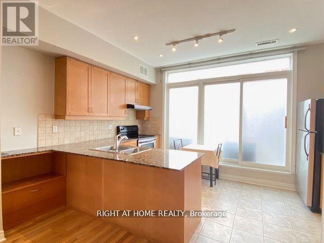 36 Michael Power Place, Toronto, Ontario  M9A 5G9 - Photo 3 - W12142954