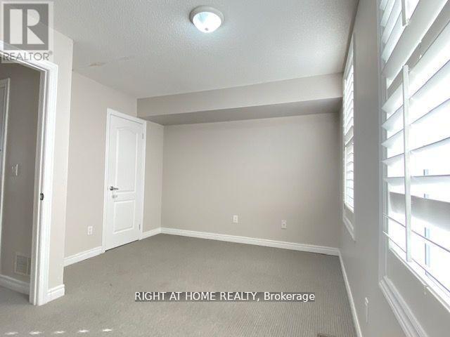 36 Michael Power Place, Toronto, Ontario  M9A 5G9 - Photo 7 - W12142954