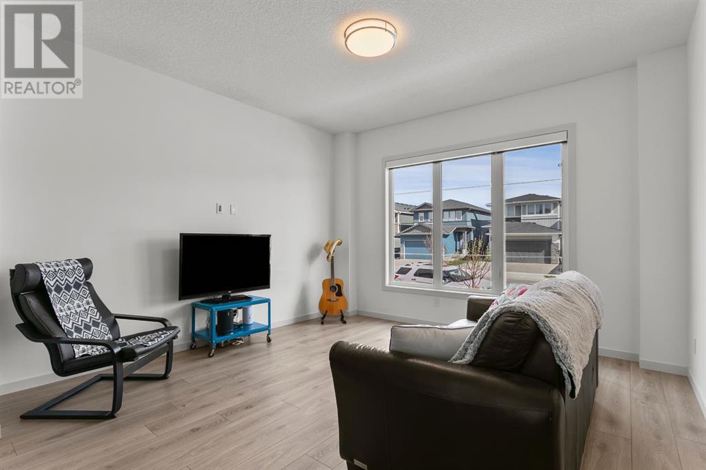 385 Fireside Way, Cochrane, Alberta  T4C 3B1 - Photo 7 - A2216411