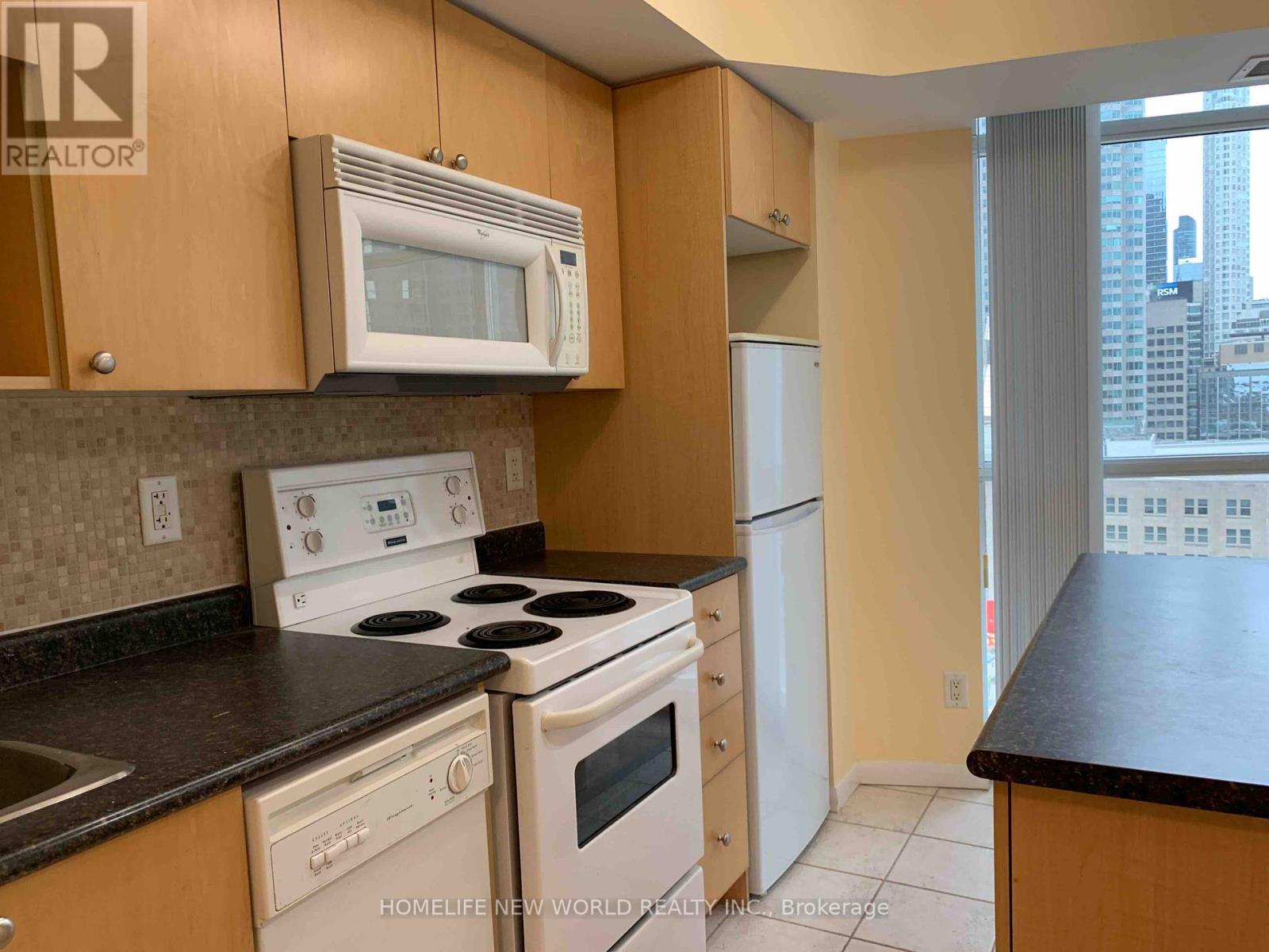 1404 - 18 Yonge Street, Toronto (Waterfront Communities), Ontario  M5E 1R4 - Photo 2 - C12143122