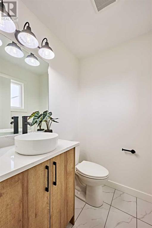 7008 Hunterview Drive Nw, Calgary, Alberta  T2K 4P3 - Photo 19 - A2219725