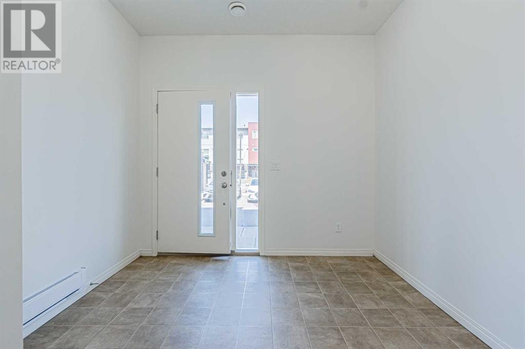 201, 70 Saddlestone Drive Ne, Calgary, Alberta  T3J 0W4 - Photo 2 - A2218121